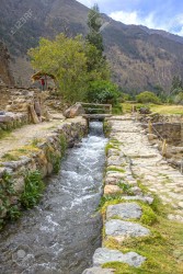 31670697-Ancient-irrigation-system-at-Inca-ruin-at-Ollantaytambo.jpg