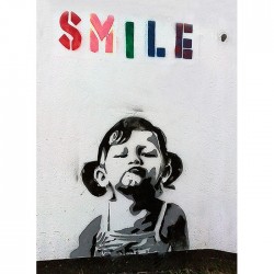 Banksy-Smile-Girl--p2-700x700.jpg